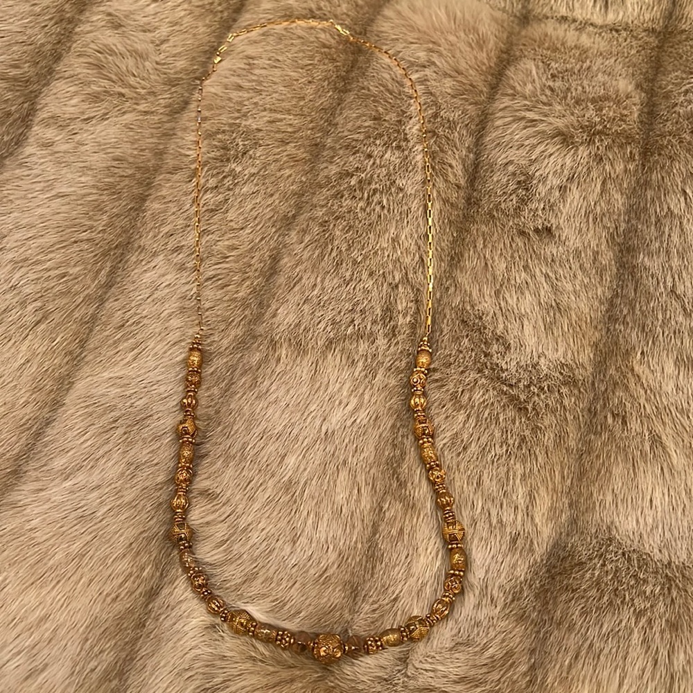 Beautiful costume faux gold beaded necklace.